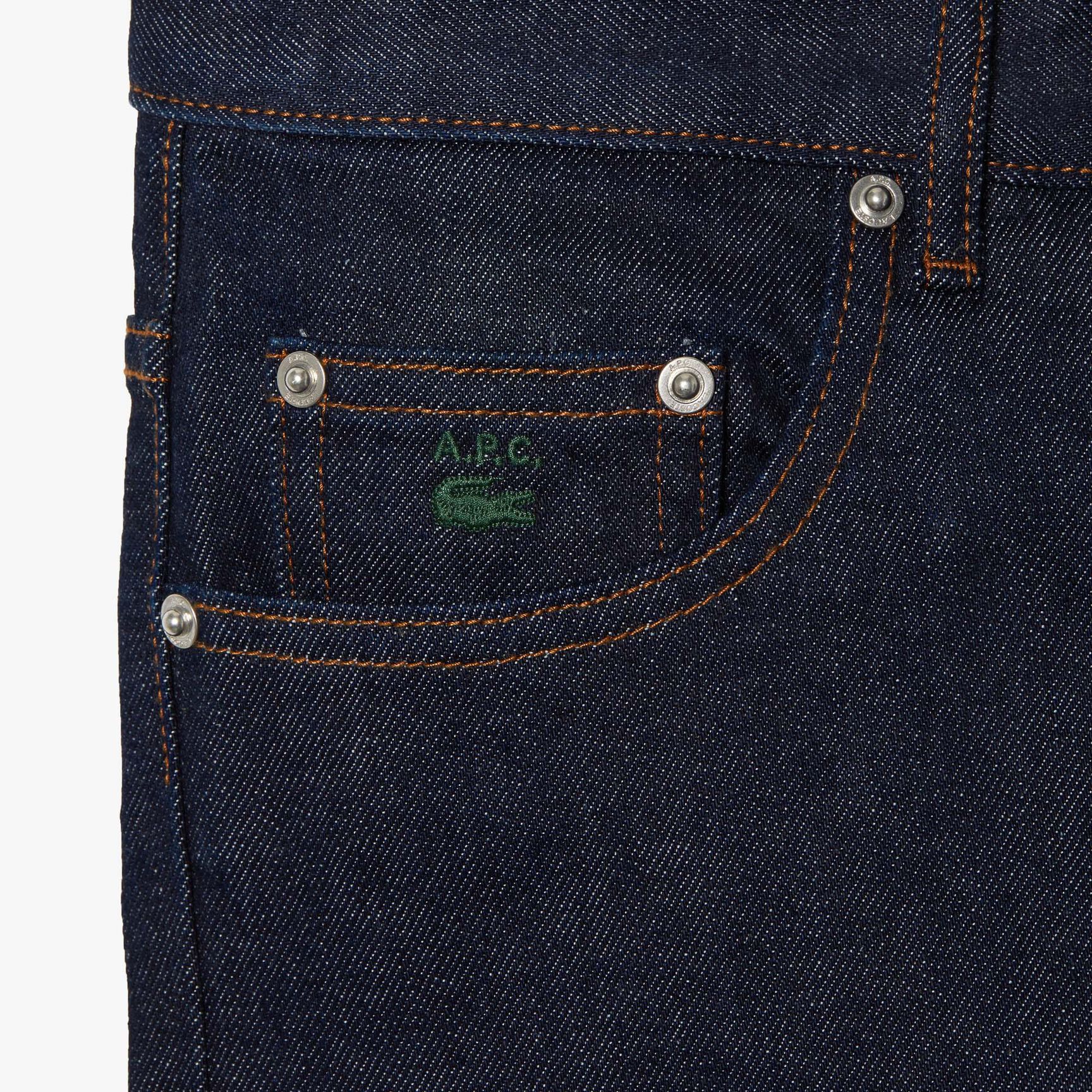 بنطال جينز بخصر منخفض للجنسين مجموعة Lacoste x A.P.C. بنطال جينز بخصر منخفض للجنسين مجموعة Lacoste x A.P.C.